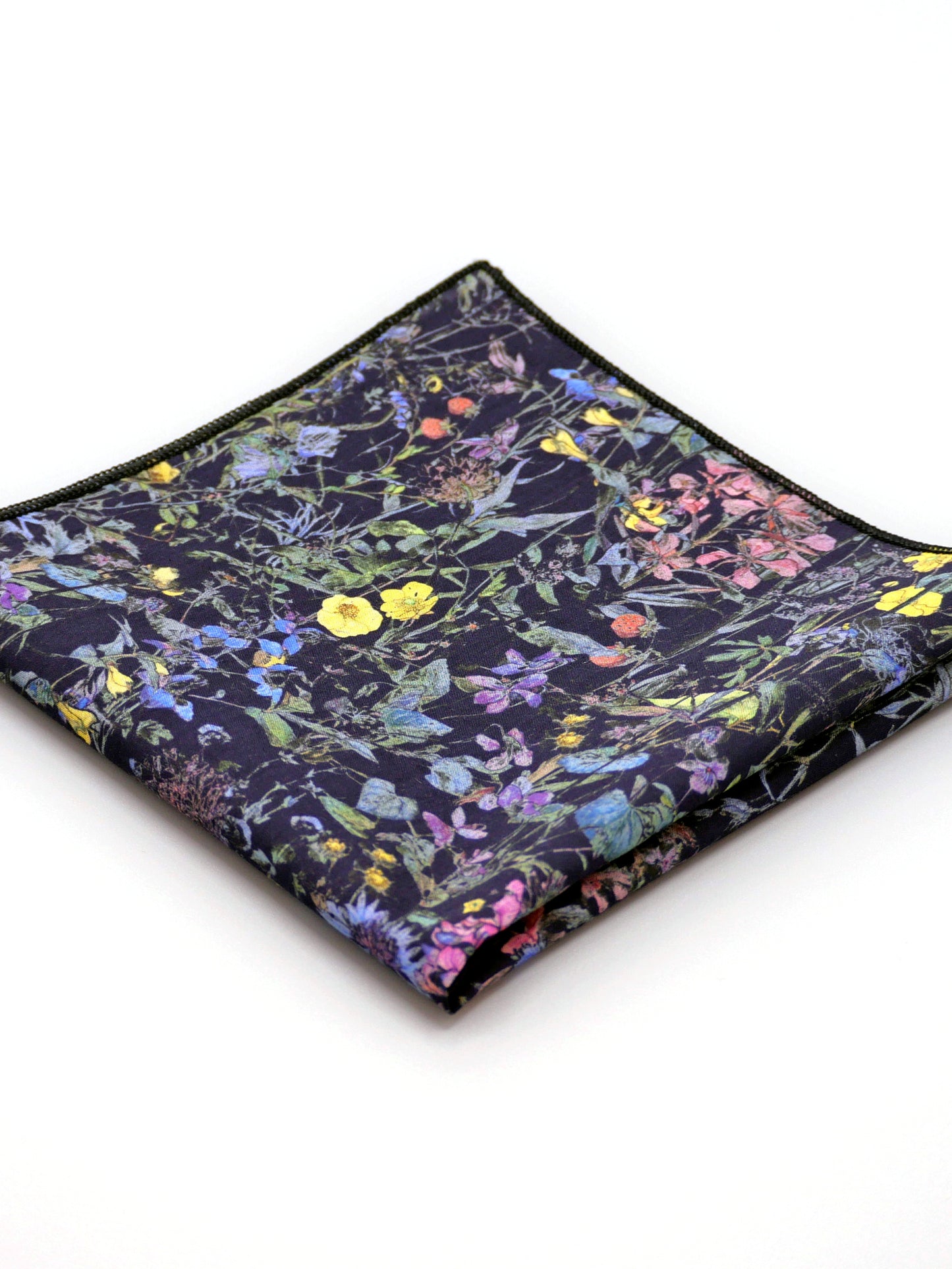 Floral patterned Liberty print pocket square on a pale grey background