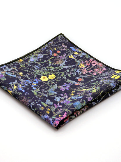 Floral patterned Liberty print pocket square on a pale grey background