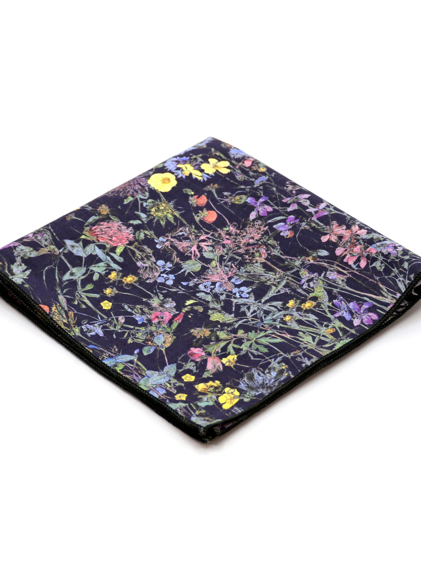 Floral patterned Liberty print pocket square on a pale grey background