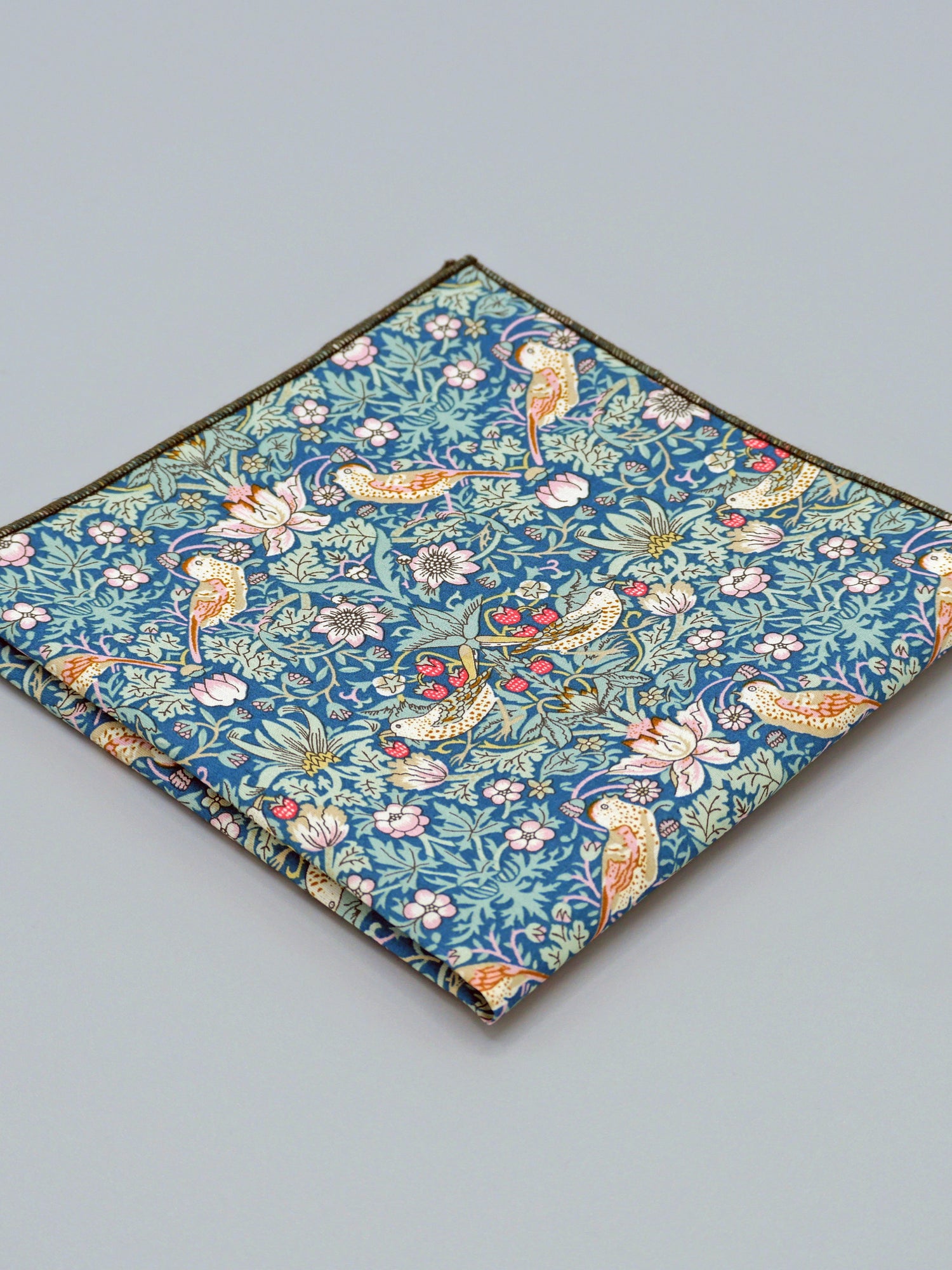 William Morris Strawberry Thief print floral patterned pocket square with a bird and strawberry motif