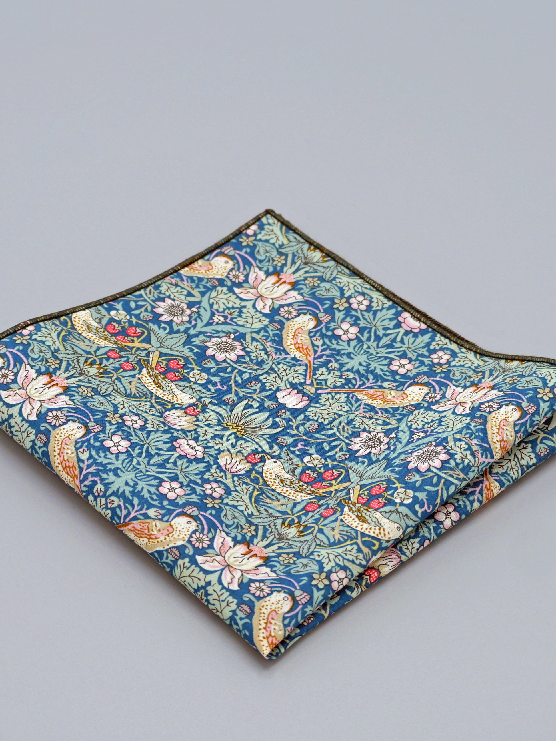 William Morris Strawberry Thief print floral patterned pocket square with a bird and strawberry motif