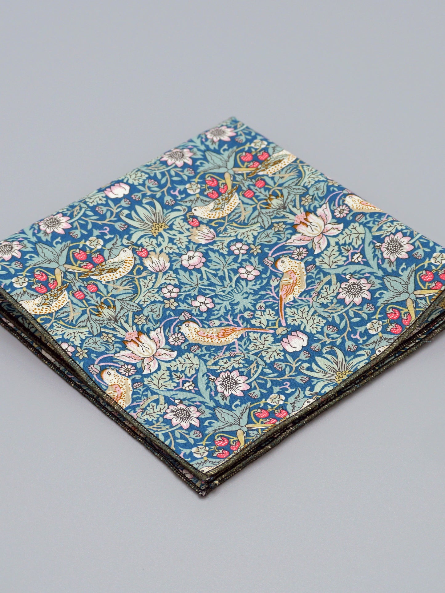 William Morris Strawberry Thief print floral patterned pocket square with a bird and strawberry motif