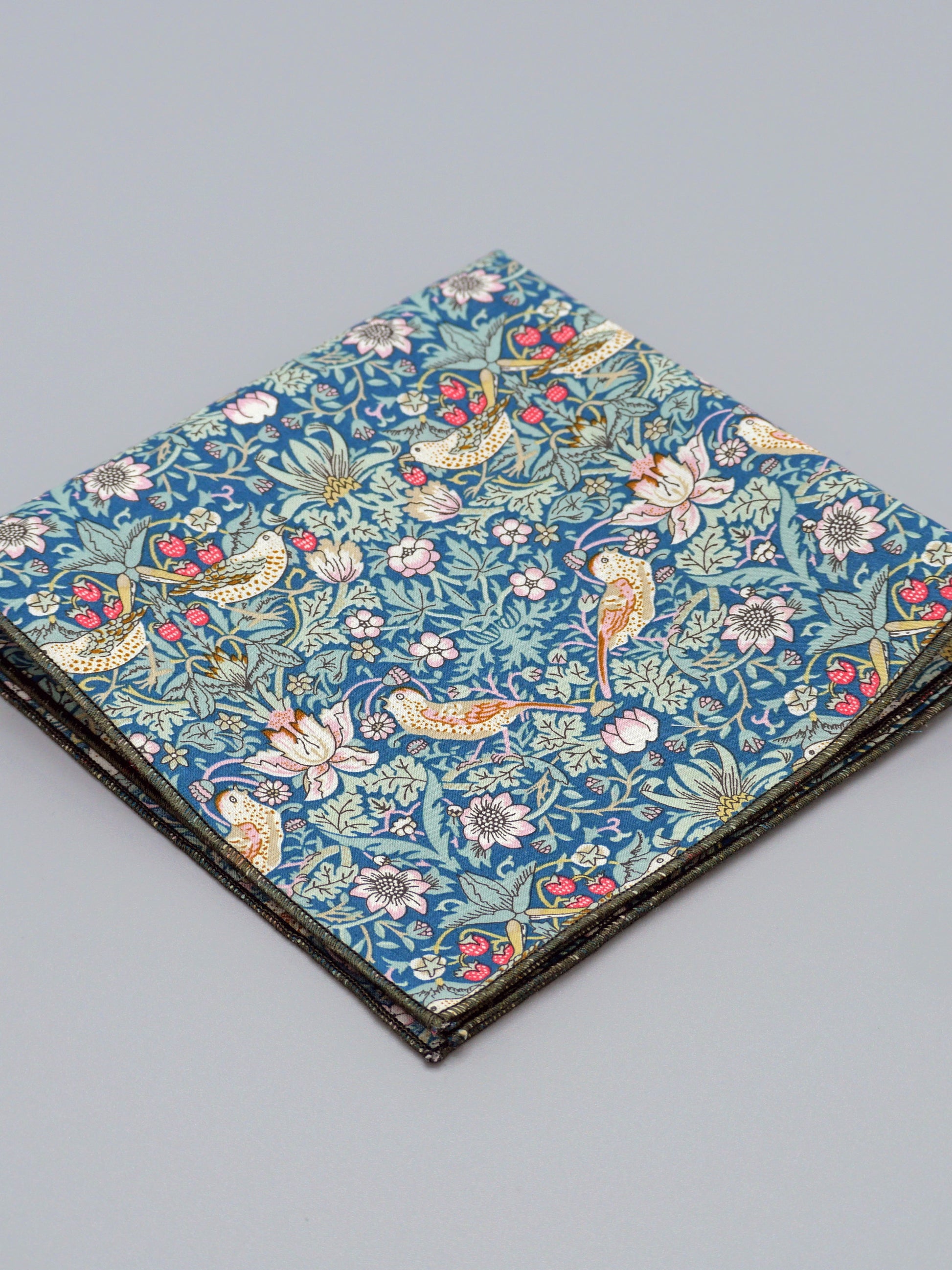 William Morris Strawberry Thief print floral patterned pocket square with a bird and strawberry motif