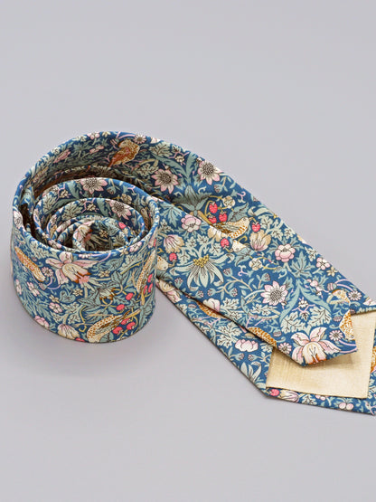 William Morris Strawberry Thief print floral patterned tie with a bird and strawberry motif and cream lining